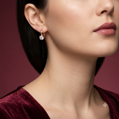 The Celeste Solitaire Huggie Earrings