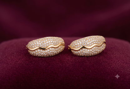 The Celeste Wave Pavé Huggies