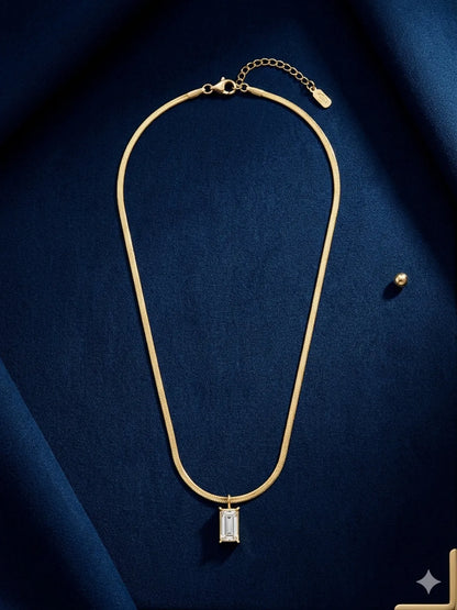 The Emerald-Cut Solitaire Herringbone Pendant
